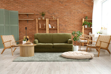 Interior of stylish living room with green sofa and wooden furniture