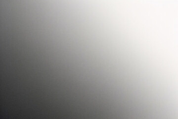 A tight shot of a polished metal surface adorned with a silver pattern, overlain by silver metallic foil
