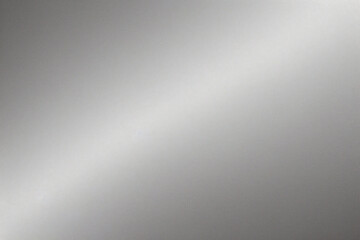 A tight shot of a polished metal surface adorned with a silver pattern, overlain by silver metallic foil
