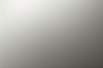 A tight shot of a polished metal surface adorned with a silver pattern, overlain by silver metallic foil
