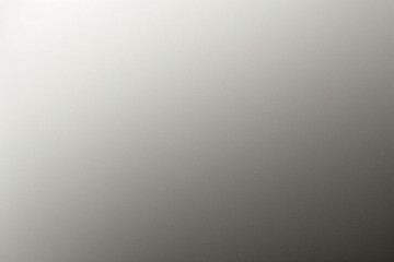 A tight shot of a polished metal surface adorned with a silver pattern, overlain by silver metallic foil
