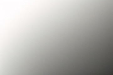 A tight shot of a polished metal surface adorned with a silver pattern, overlain by silver metallic foil
