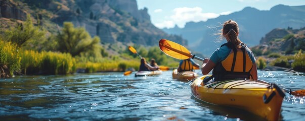 Friends joyfully paddling kayaks down a river