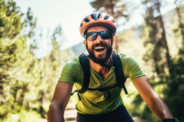 Naklejka premium Bearded man biking happily along a sunlit forest path wearing a helmet