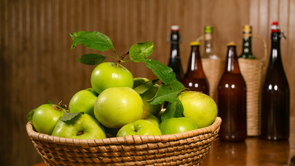 box of apples with cider bottle bottoms