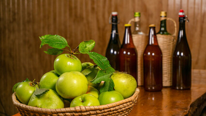 box of apples with cider bottle bottoms