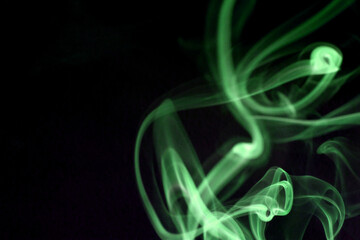 Close up of smoke swirl on black background