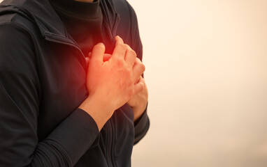 Cropped shot view of woman having respiratory allergy caused of by Bad air pollution (PM2.5).