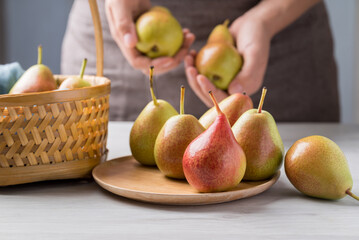 Fresh pear fruit with hand preparing for eating