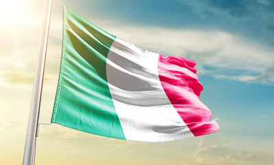Italy national flag waving in beautiful sky.