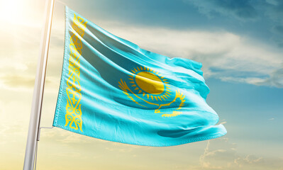 Kazakhstan national flag waving in beautiful sky.