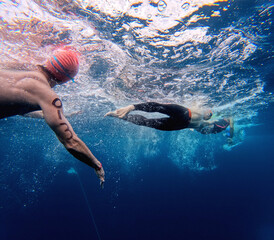 person swimming in the sea