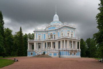Obraz premium The Sliding Hill Pavilion in the upper park of the Oranienbaum Palace and Park Ensemble on a sunny summer day, Lomonosov, St. Petersburg, Russia