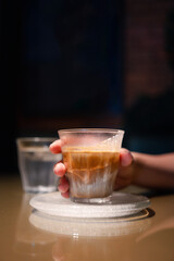 A specialty coffee menu called Dirty coffee is a shot of espresso poured from the coffee machine into cold milk.