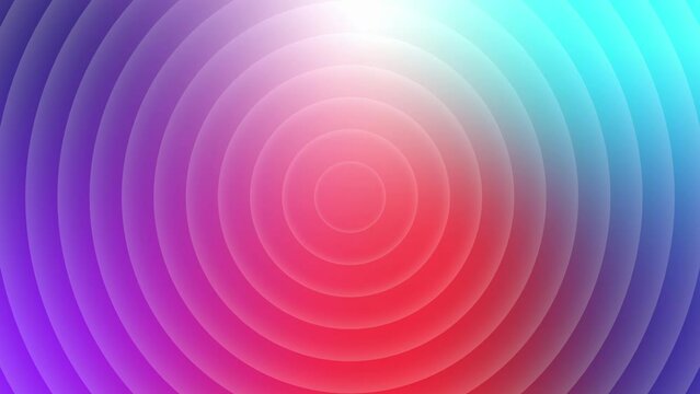 Vibrant abstract background featuring concentric circles in gradient colors of red, blue, and purple, creating a dynamic visual effect.