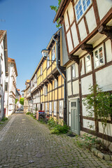 Fototapeta premium scenic old half timbered houses of poor people in the historic Adolfstrasse in Detmold,