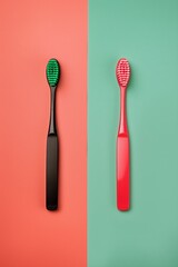 A black toothbrush with green bristles and a red toothbrush with red bristles against a split colorful background.
