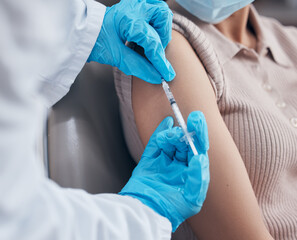 Hands, medical and doctor with patient for vaccine in clinic for healthcare, treatment and prevention. Closeup, woman and injection with needle for flu shot, medicare and syringe in hospital