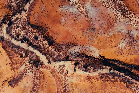 Abstract Aerial View of Desert Terrain With Red Rocks and Dirt Textures Patterns Kimberley Broome Pilbara Region Western Australia 