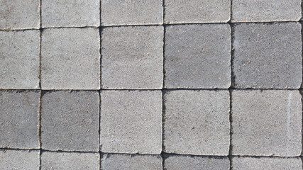 street floor tiles grey background paving stones surface road texture made of square cement bricks...