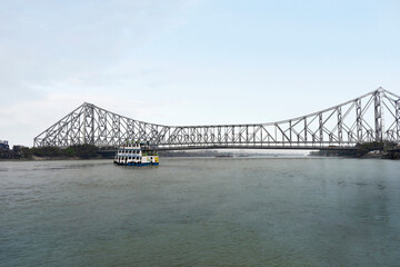 Howrah Bridge, spanning the Hoogli River in Kolkata, West Bengal, is an iconic engineering marvel and major landmark. Howrah Bridge, Kolkata, West Bengal, India