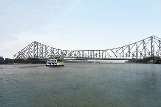 Howrah Bridge, spanning the Hoogli River in Kolkata, West Bengal, is an iconic engineering marvel and major landmark. Howrah Bridge, Kolkata, West Bengal, India