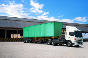 Semi Trailer Trucks on The Parking Lot at Warehouse. Truck Loading Goods at Warehouse. Container Shipping. Package Boxes Pallets. Trucking. Lorry Diesel Truck. Freight Truck Logistics Cargo Transport.