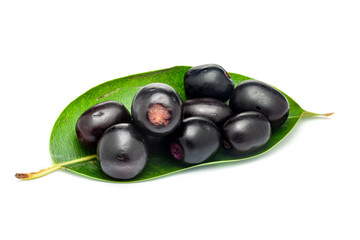 Close-up of 'Indian blackberry' or Jamun (Syzygium cumini) fresh fruits, on a wooden background. Front view.