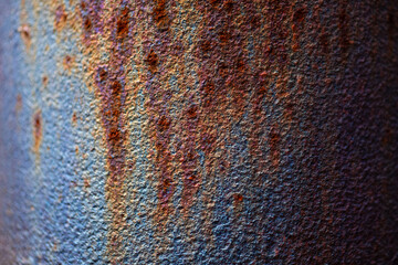 Rusty and corroded steel pipe or tube surface at a ruined factory. Dots of brownish rust  with...