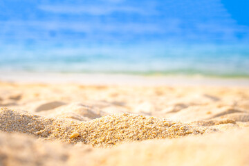 Nature of the beach and sea Summer with sunshine, sandy beaches, clear blue waters sparkling against the blue sky. On an island with good ecology and environment Background for summer vacation concept