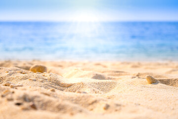 Nature of the beach and sea Summer with sunshine, sandy beaches, clear blue waters sparkling against the blue sky. On an island with good ecology and environment Background for summer vacation concept