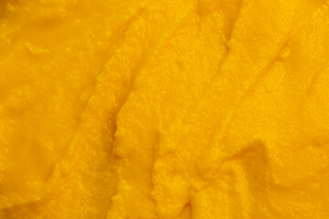 Fruit yogurt ice cream. Smoothies from fresh fruits and berries. Ice cream texture. Delicious sweet dessert close-up as a background.