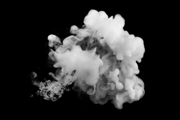 White ink dropped in to water isolated black background. Abstract white color dissolving in water