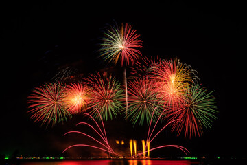 Real Fireworks at Pattaya bay, Pattaya national Fireworks Festival contest, of every Year, Beautiful of bright light fireworks Show in middle sea, for postcard wallpaper background,