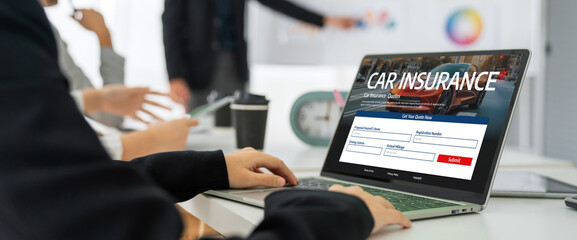 car insurance online website on computer screen for insure your car damage snugly