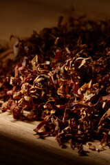 Dried cutted tobacco leaves. Textured abstract background.