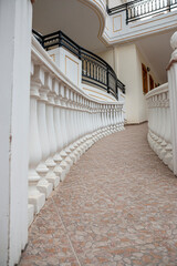 Geometric white balconies of a building, architecture detail modern building.