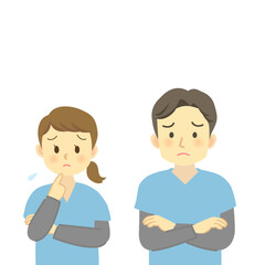 困った表情の青系のスクラブを着用した医療従事者の男女（正面を向いた困り顔/上半身）　
