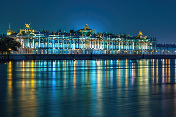 Winter Palace in Saint Petersburg illuminated at night, reflecting in the Neva River