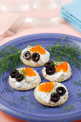 Blinis with trout caviar.