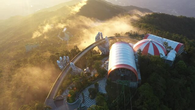 Golden hands bridge at Bana hills on cloud