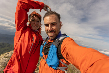 A man and a woman are smiling for a picture