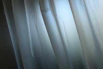 white plastic curtain texture in bathroom, scary scene