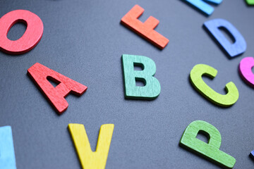 colorful letter alphabet on black background, object for education