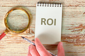 Business and ROI concept. Copy space. ROI Return of Investment. Words ROI the inscription on the...