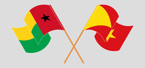 Crossed and waving flags of Guinea-Bissau and Tigray