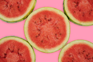 Summer fruit background concept, red round watermelon slices pattern background