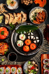 Traditional Japanese food dishes served on the table.