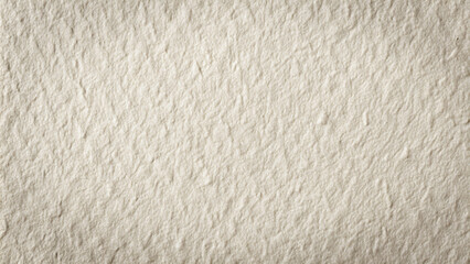 Closeup of a blank white paper background with a subtle texture