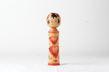 Collection of wooden dolls isolated on white background with clipping path.